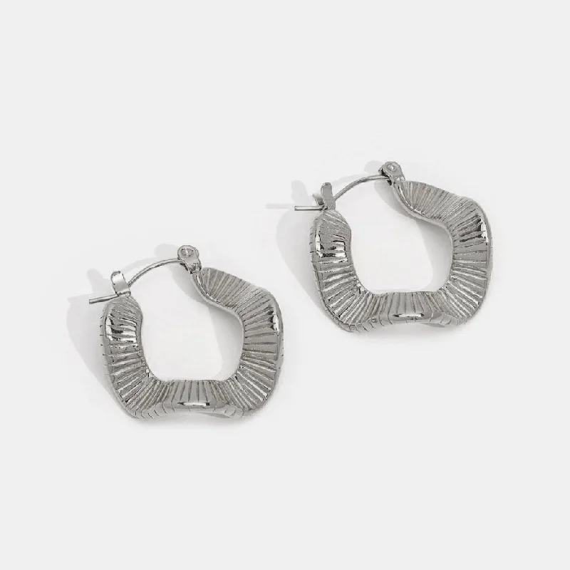 Classic hoop earrings with a thin profile for a sleek and subtle style-Geometric Wave Silver Hoop Earrings