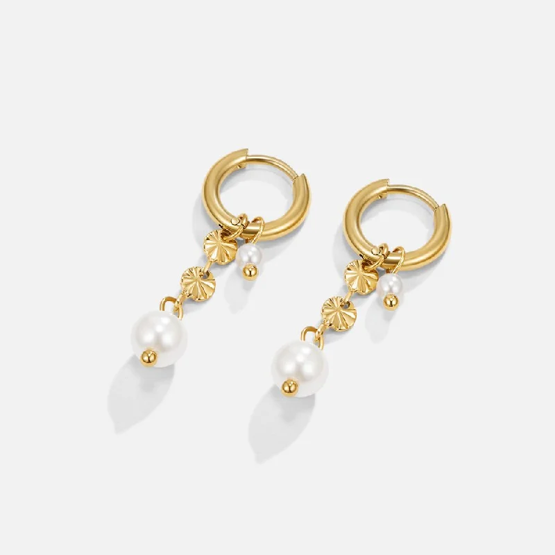 Best hoop earrings with geometric hexagon shapes for a modern, angular look-Rini Pearl Tassel Earrings