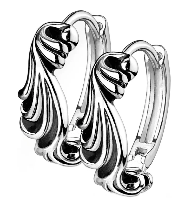 Hoop earrings with dangling charms for a playful and fun look-Wavy Stainless Steel Clicker Earrings