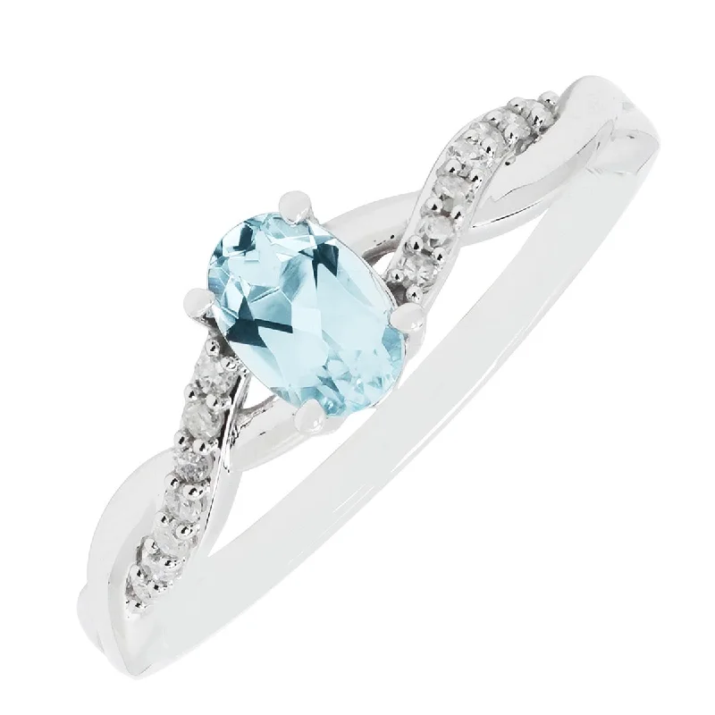 Women’s rings with fluorite stones for hues -Oval Aquamarine Ring in 10kt White Gold with Diamonds (1/10ct tw)