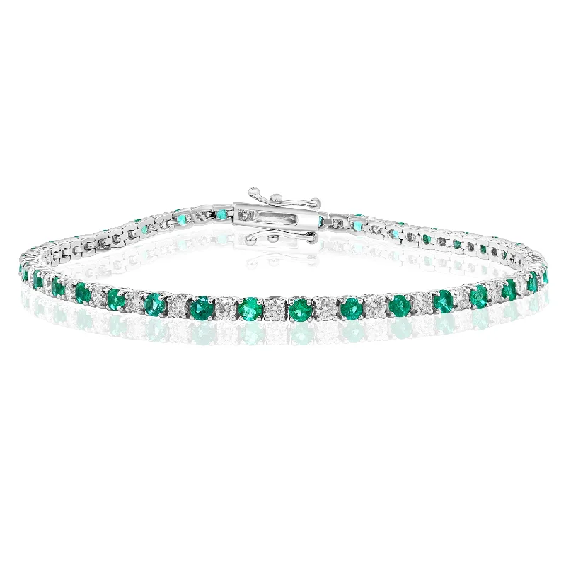 Traditional gold bangle bracelets with a smooth finish for a classic look-14K WHITE GOLD EMERALD DIAMOND BRACELET - 1.53CTW