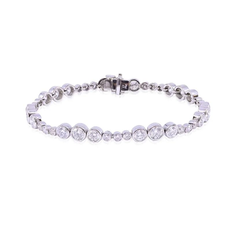 Stacked bangle bracelets with alternating textures for a dynamic, trendy look-PLATINUM DIAMOND BEZEL SET TENNIS BRACELET - 6.15CTW