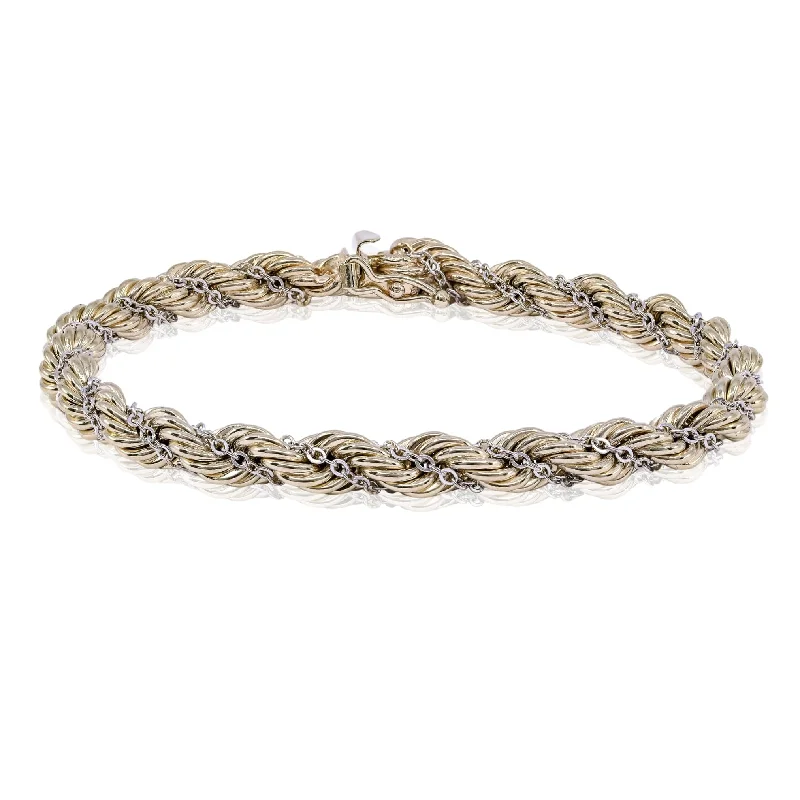 Best bangle bracelets with intricate filigree patterns for an elegant and detailed finish-ESTATE 14K YELLOW AND WHITE GOLD BRAIDED ROPE BRACELET