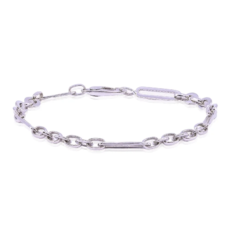 Bold bangle bracelets with mixed materials like wood, metal, and fabric-LUIGI TAVANTI 18K WHITE GOLD OVAL LINK BRACELET