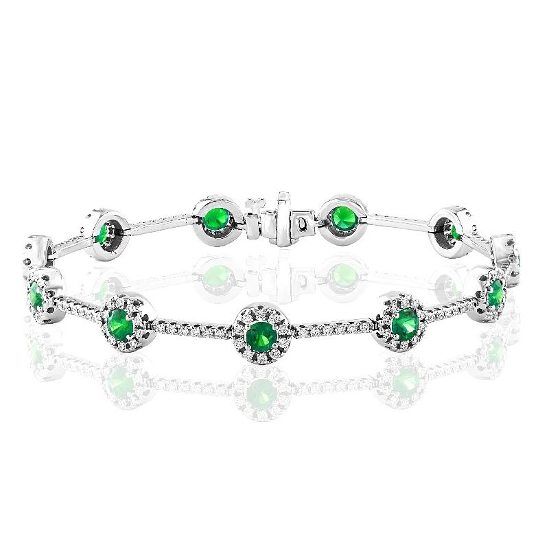 Wide bangle bracelets with modern geometric patterns for a bold fashion statement-14K WHITE GOLD EMERALD DIAMOND HALO BRACELET