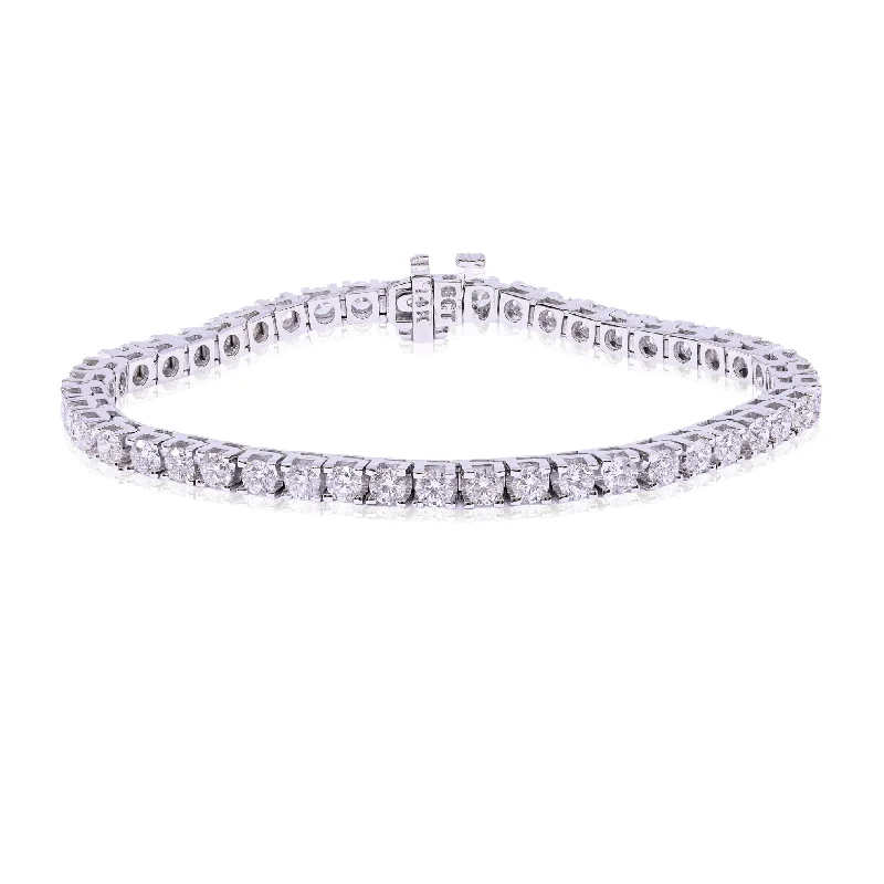 Traditional gold bangle bracelets with a smooth finish for a classic look-14K WHITE GOLD DIAMOND TENNIS BRACELET - 6.00CTW