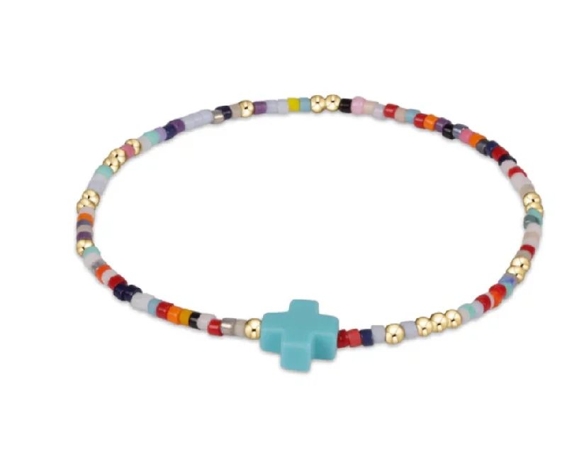 Best bangle bracelets with durable enamel finishes for long-lasting wear and vibrant colors-egirl hope unwritten bracelet signature cross - hot mess by enewton