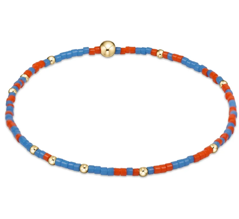 Bangle bracelets with gold and silver mixed metals for a stylish and versatile accessory-enewton extends - gameday hope unwritten bracelet - bright orange-cobalt