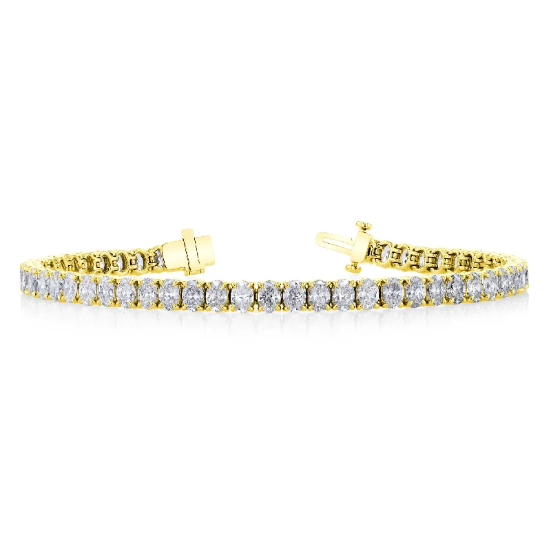 Chunky bangle bracelets with metallic finishes for a bold and statement-making look-18K YELLOW GOLD OVAL DIAMOND TENNIS BRACELET - 10.23CTW