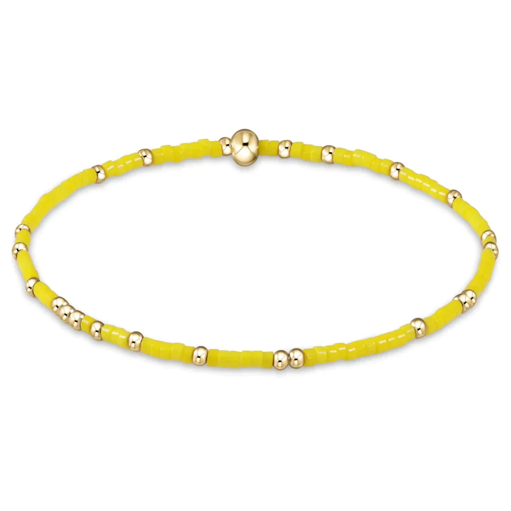 Best bangle bracelets with solid gold for an elegant and luxurious design-gameday hope unwritten bracelet - golden yellow by enewton