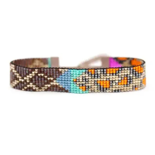 Best bangle bracelets for stacking with delicate and thin designs for layering-JULIE ROFMAN - LEOPARD GIRAFFE BRACELET