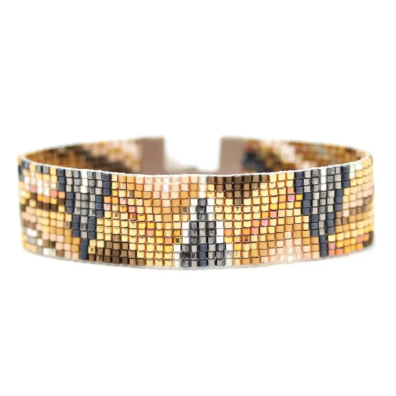 Wide bangle bracelets with bohemian designs for a bold and carefree style-JULIE ROFMAN - ORO BRACELET