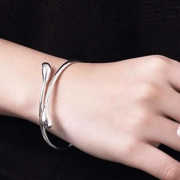 Best bangle bracelets with sapphire stones for an elegant and rich pop of color-Teardrop Bangle in Sterling Silver