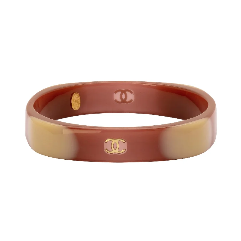 Colorful bangle bracelets with enamel details for a playful and youthful style-Chanel Brown & White Acrylic Bangle